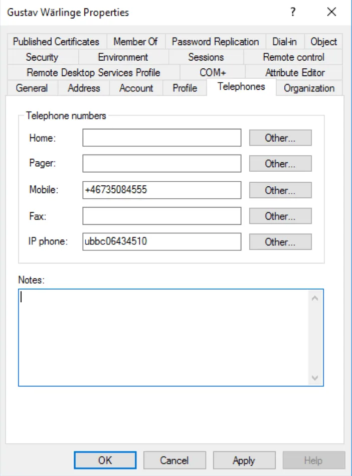 Active Directory Users and Computers showing YubiKey serial number in IP Phone field